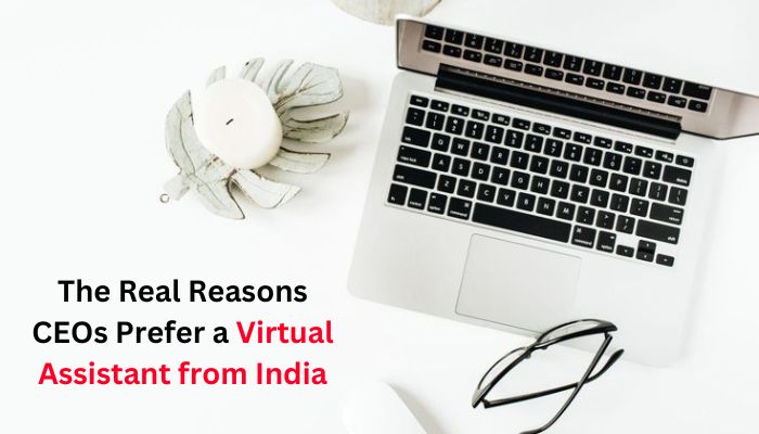 Flat lay of a laptop, glasses, and decor with the text "The Real Reasons CEOs Prefer a Virtual Assistant from India